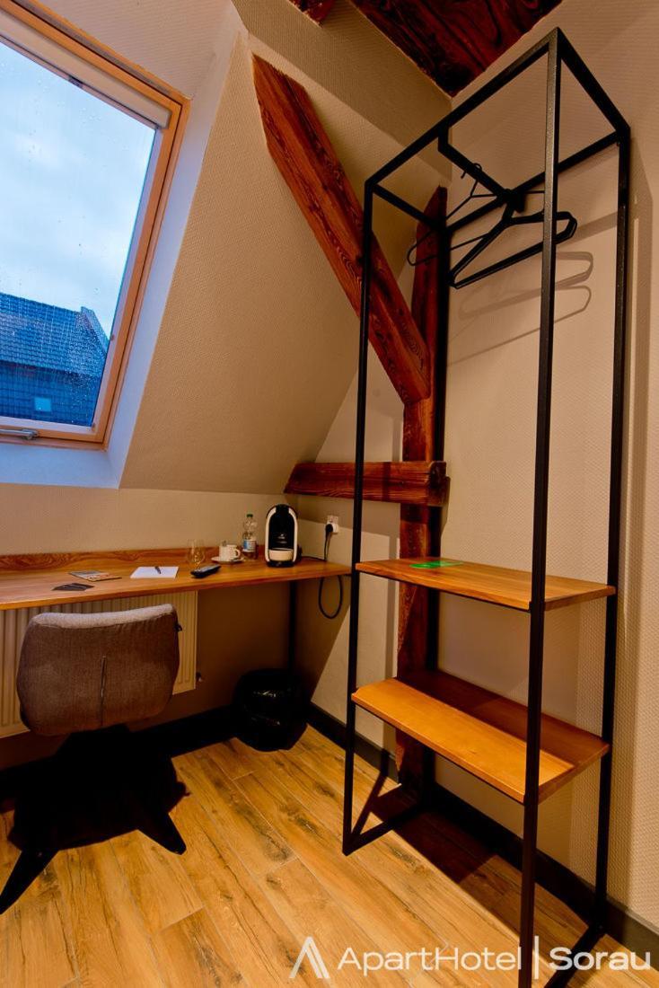 جاره Apartsuites I Sorau المظهر الخارجي الصورة A room at the hotel