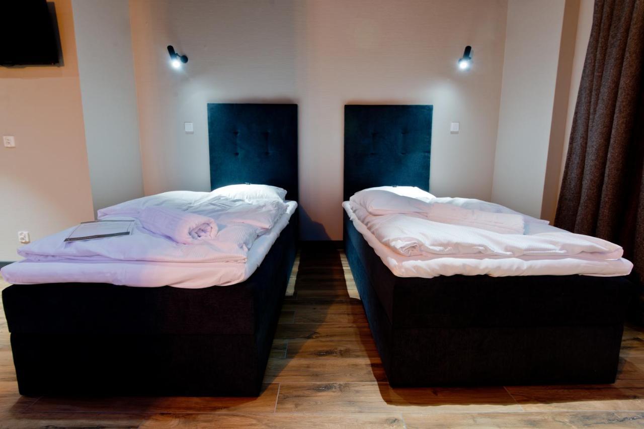 جاره Apartsuites I Sorau المظهر الخارجي الصورة A room at the hotel