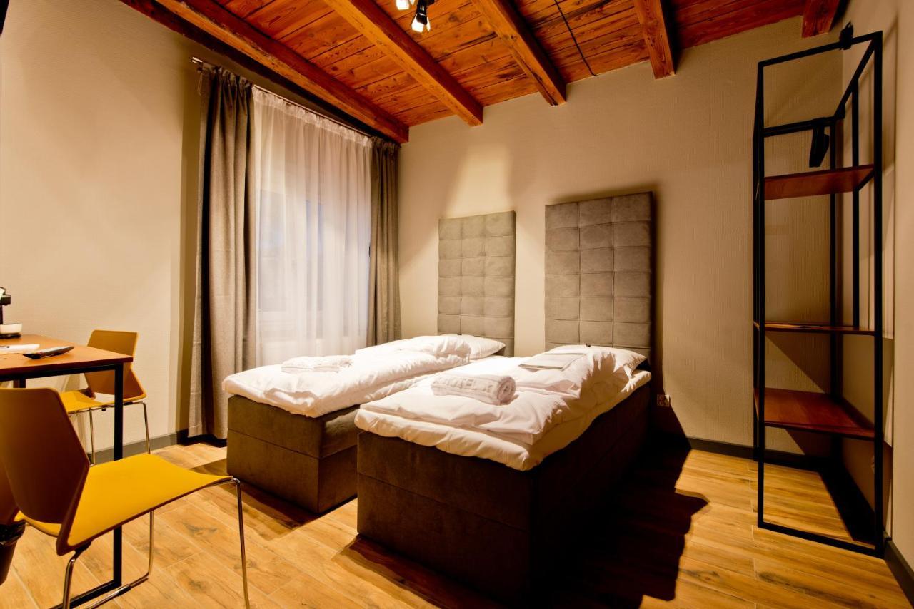 جاره Apartsuites I Sorau المظهر الخارجي الصورة A room at the hotel