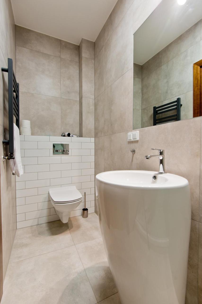 جاره Apartsuites I Sorau المظهر الخارجي الصورة Bathroom