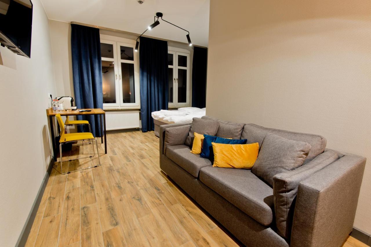 جاره Apartsuites I Sorau المظهر الخارجي الصورة A typical studio apartment in Berlin, Germany